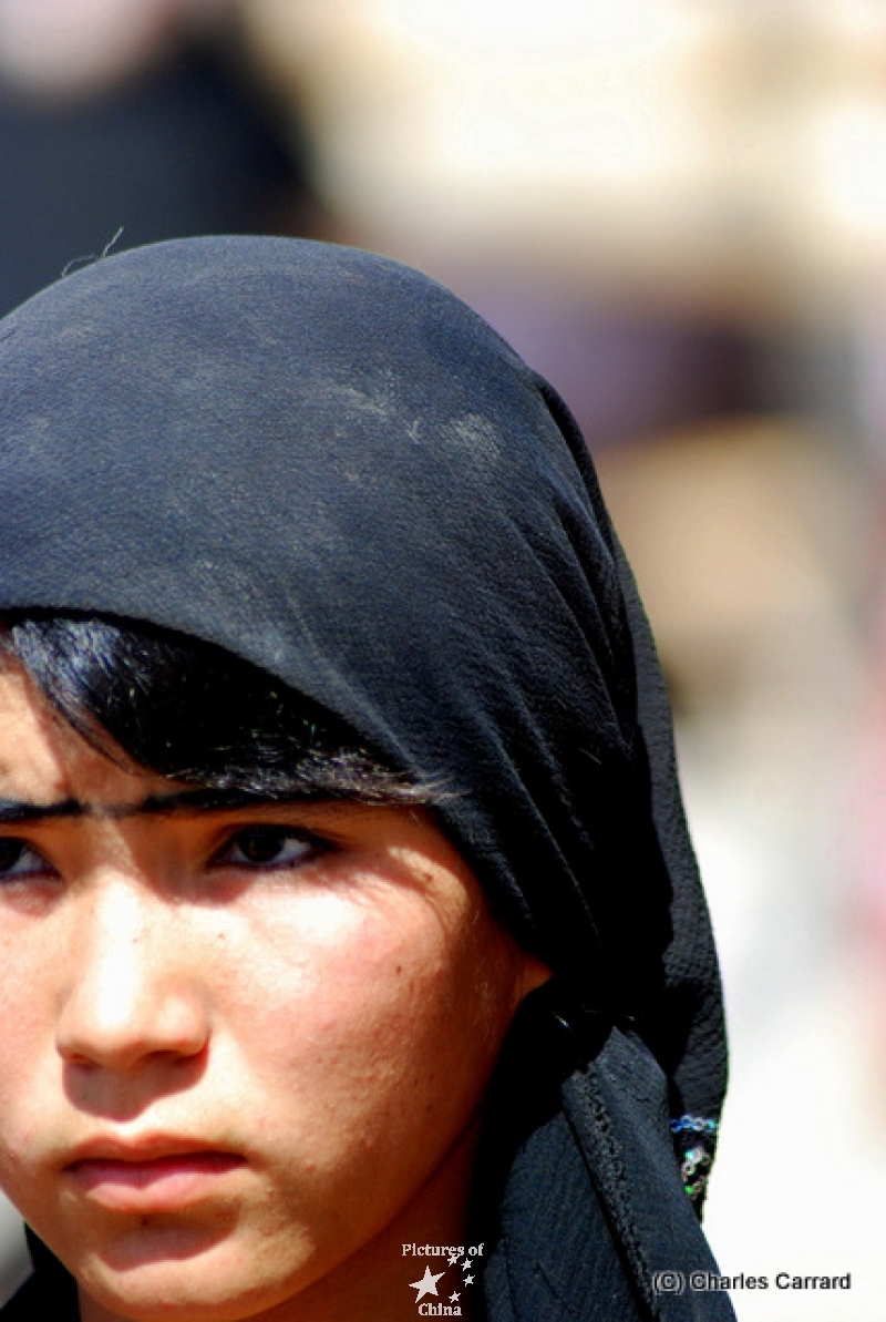 Young Tadjik girl with veil