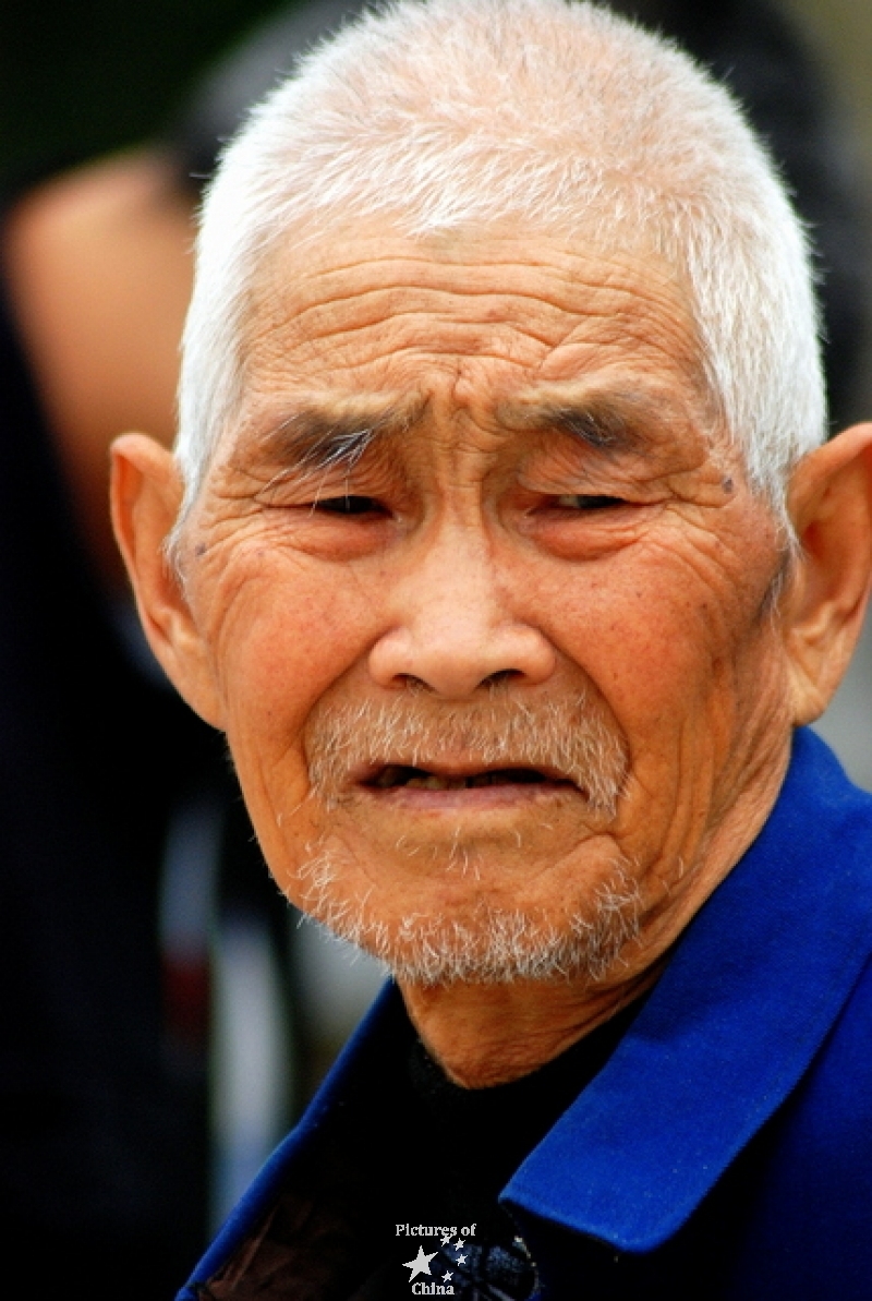 Old man with blue suit